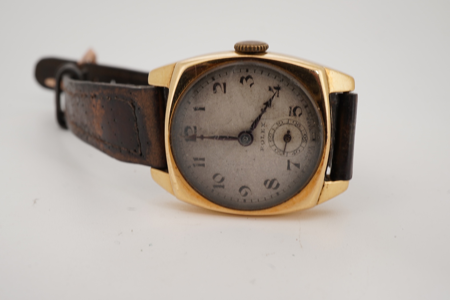A gentleman's late 1920's 18ct gold Rolex manual wind wrist watch